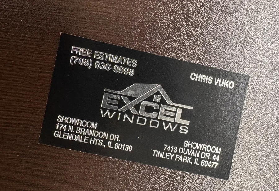 Chris Vuko's old Excel business card, listing the Glendale Heights and original Tinley Park showrooms.