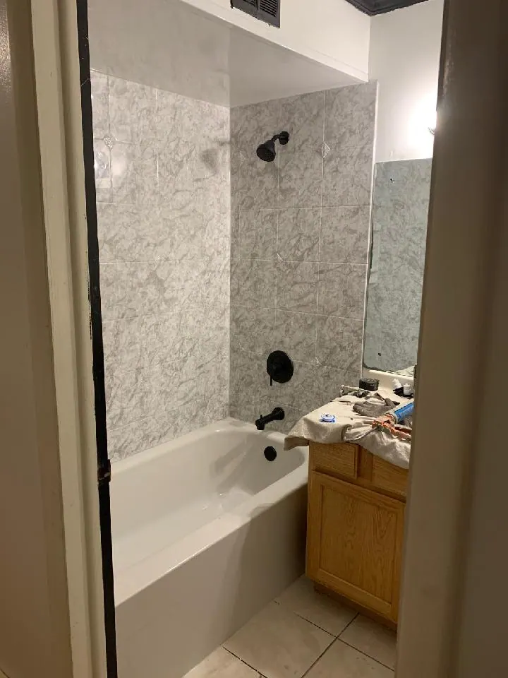 Finished tub and shower with a solid-surface surround, an Excel install in Chicagoland's south suburbs