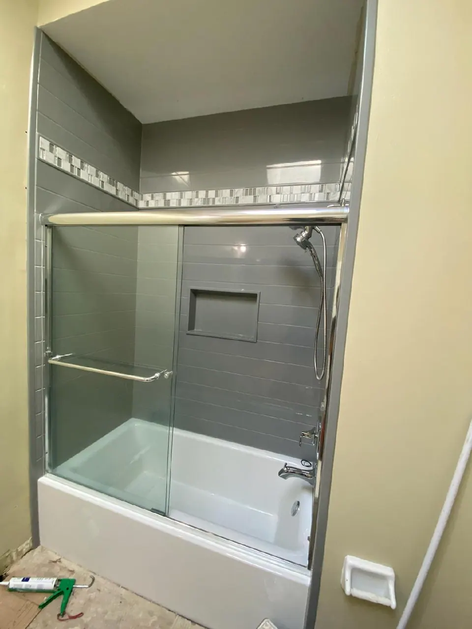 Finished tub and shower with a solid-surface surround, an Excel install in Chicagoland's south suburbs