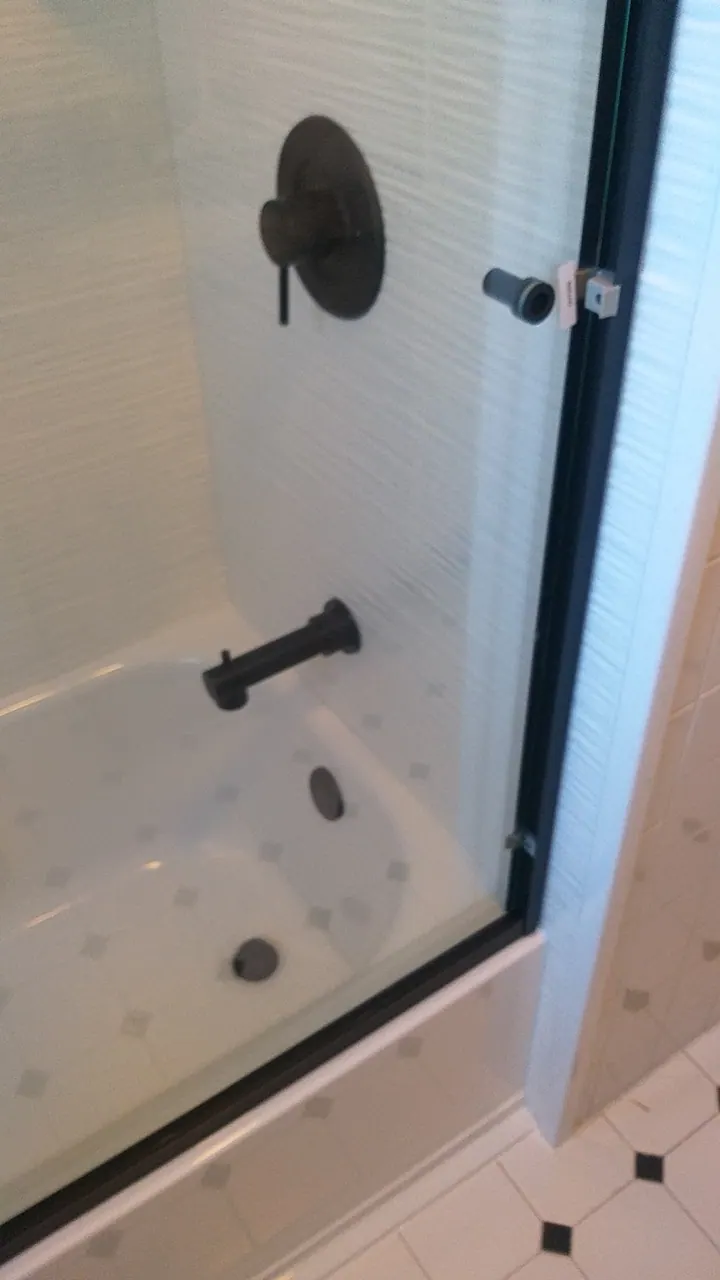 Finished tub and shower with a solid-surface surround, an Excel install in Chicagoland's south suburbs