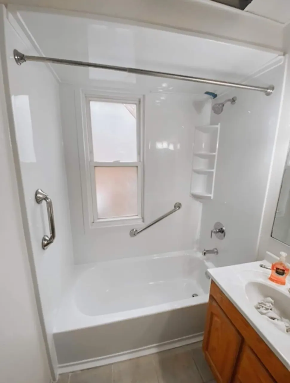 Finished tub and shower with a solid-surface surround, an Excel install in Chicagoland's south suburbs