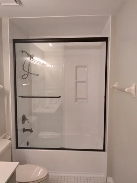 Finished tub and shower with a solid-surface surround, an Excel install in Chicagoland's south suburbs