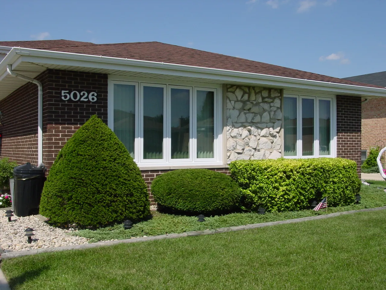 Casement windows on a brick ranch, Chicagoland south suburbs