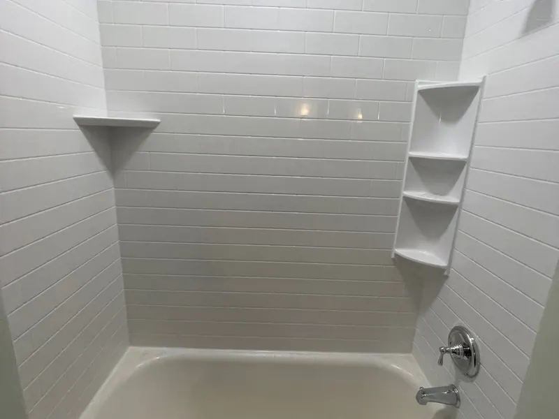 Finished remodeled bathroom with a modern vanity and a lighted mirror, an Excel install in the south suburbs
